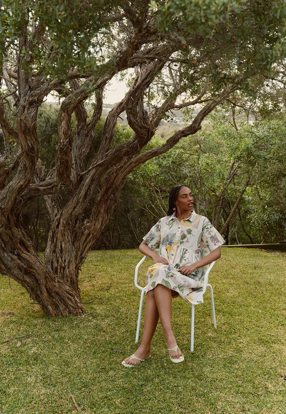 Nancybird Luma Dress in Archive Floral, photographed in a garden