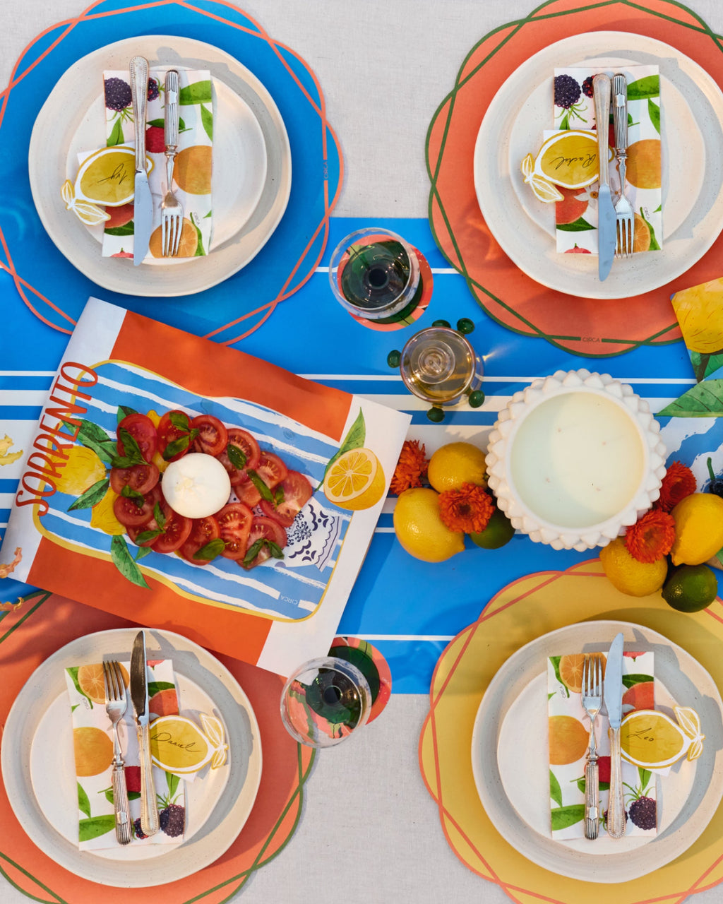 Summer paper table runner with white stripes on a blue background.