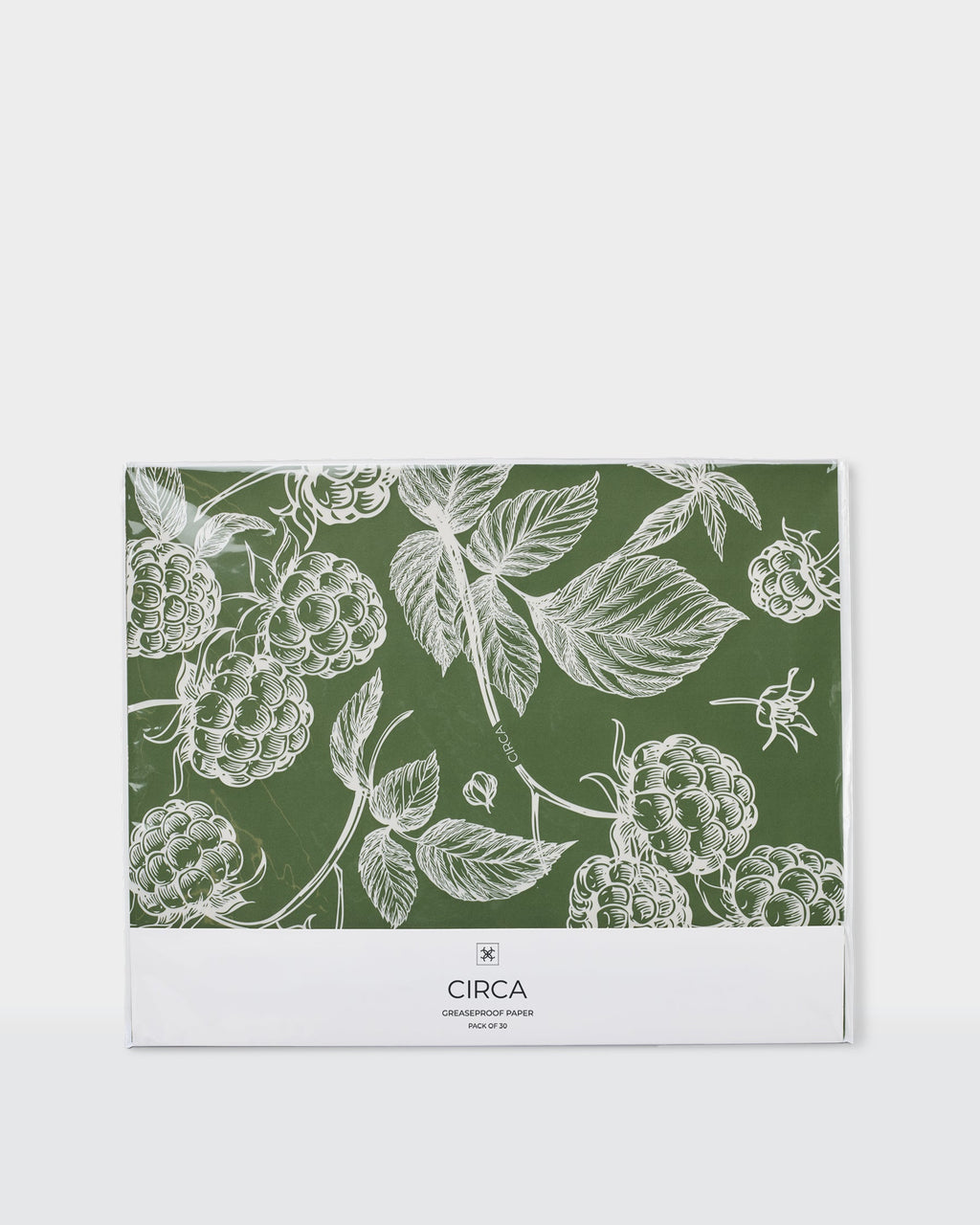 Festive greaseproof paper featuring green botanical prints and gingerbread designs.