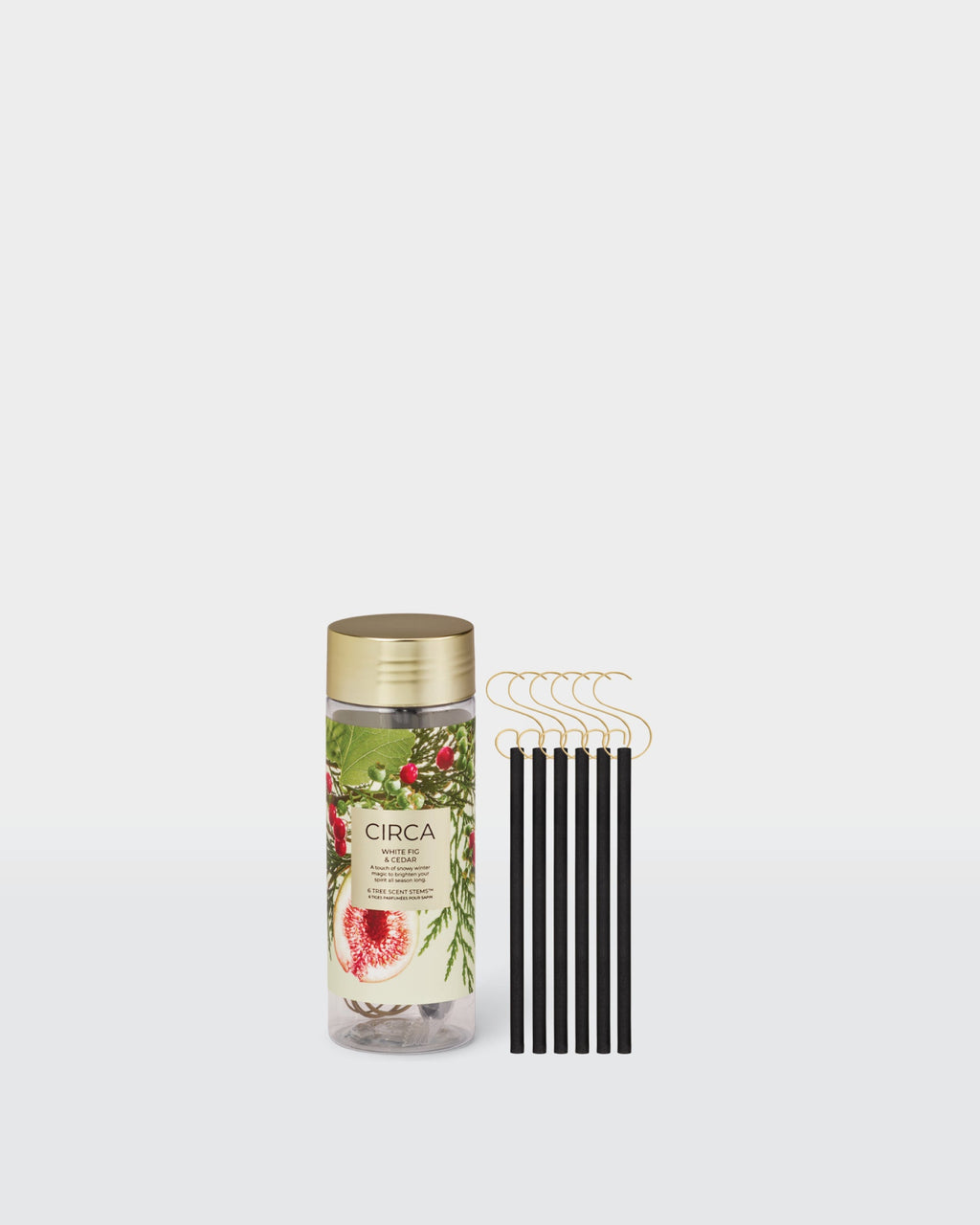 White Fig & Cedar Christmas Tree Scent Stems with hooks beside their botanical storage tube.